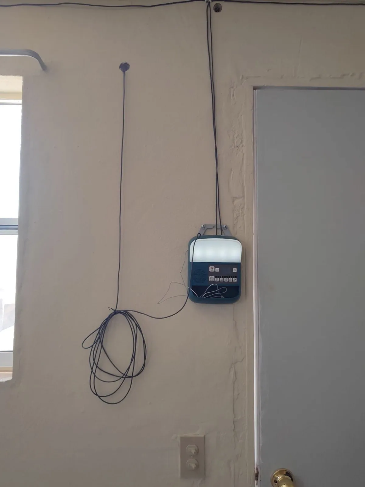 BioLite solar control panel and light installed on a wall